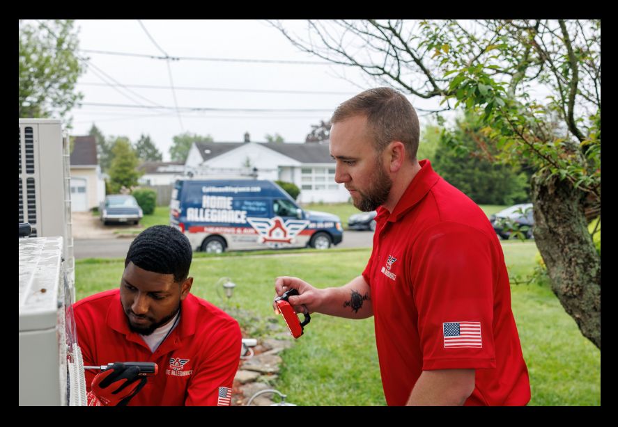 Home Allegiance technicians with branded van on a Hamilton Township street